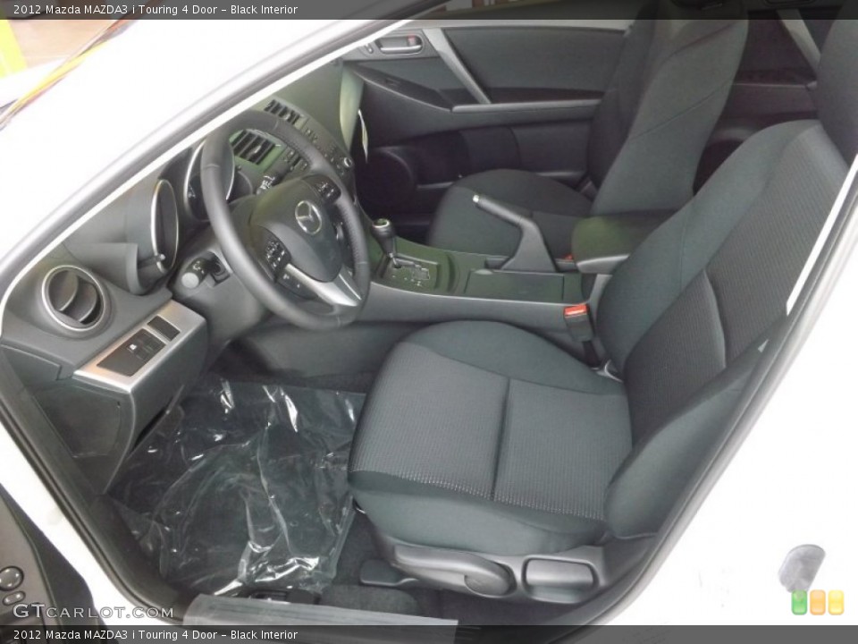 Black Interior Front Seat for the 2012 Mazda MAZDA3 i Touring 4 Door #66613778