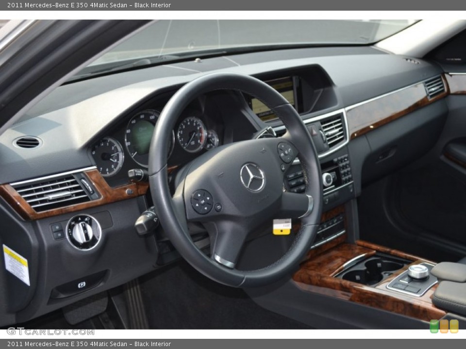 Black Interior Dashboard for the 2011 Mercedes-Benz E 350 4Matic Sedan #66625313