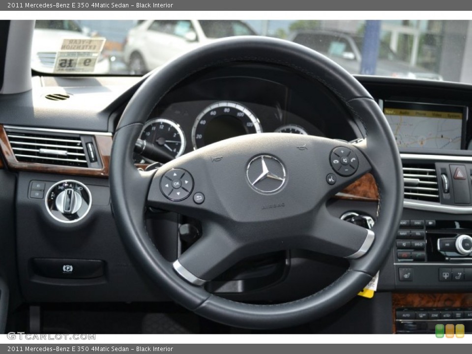 Black Interior Steering Wheel for the 2011 Mercedes-Benz E 350 4Matic Sedan #66625334