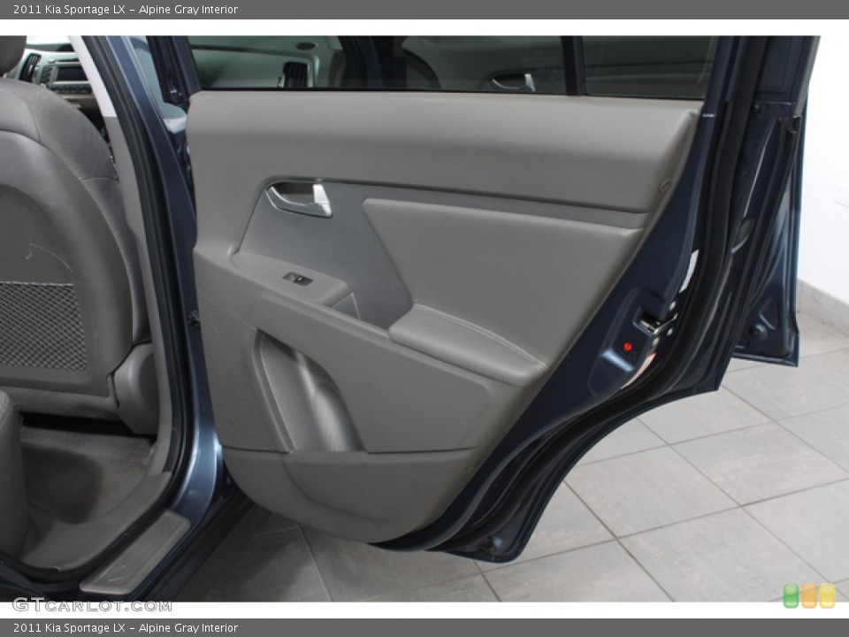 Alpine Gray Interior Door Panel for the 2011 Kia Sportage LX #66642686