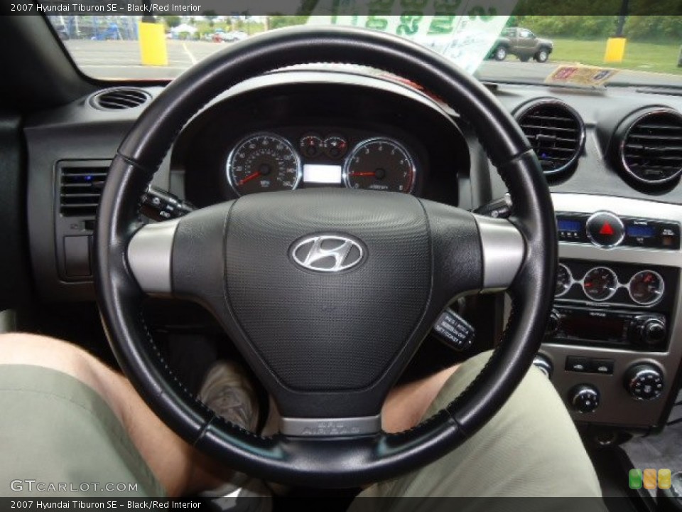 Black/Red Interior Steering Wheel for the 2007 Hyundai Tiburon SE #66654224