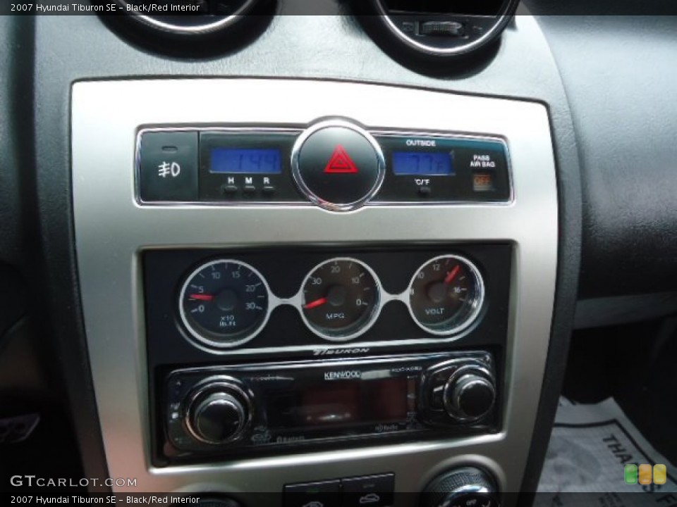 Black/Red Interior Controls for the 2007 Hyundai Tiburon SE #66654251