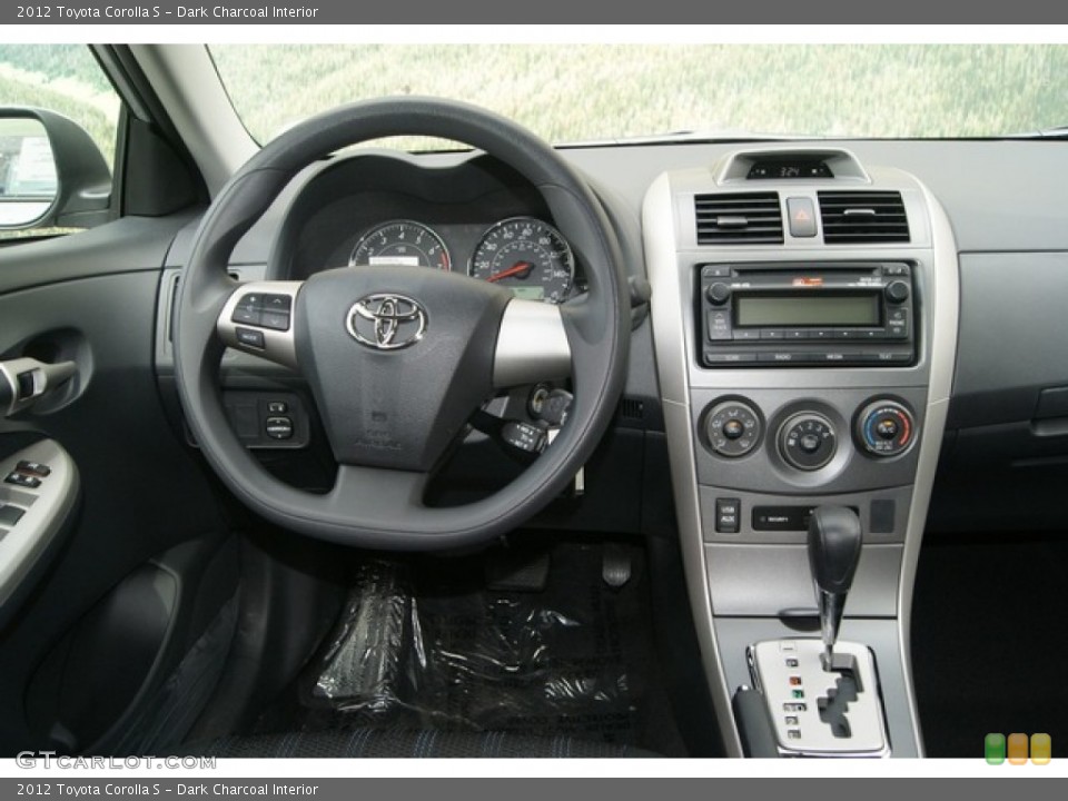 Dark Charcoal Interior Dashboard for the 2012 Toyota Corolla S #66655344