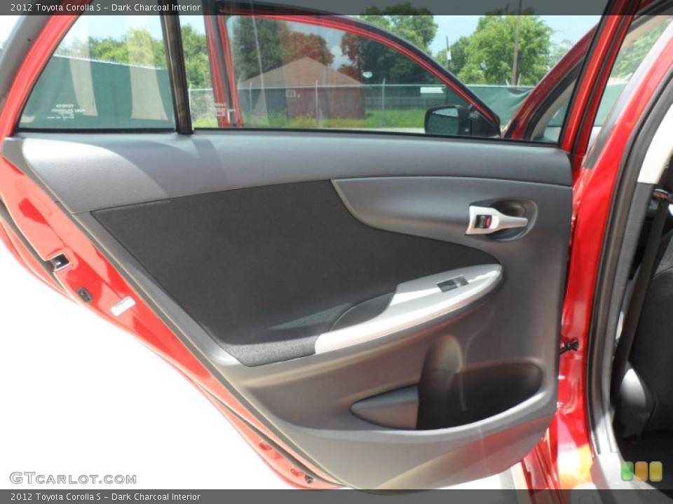 Dark Charcoal Interior Door Panel for the 2012 Toyota Corolla S #66657389