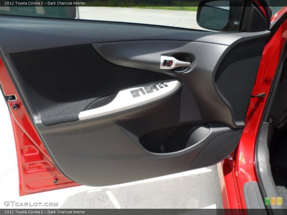 Dark Charcoal Interior Door Panel for the 2012 Toyota Corolla S #66657407
