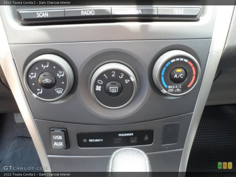 Dark Charcoal Interior Controls for the 2012 Toyota Corolla S #66657483