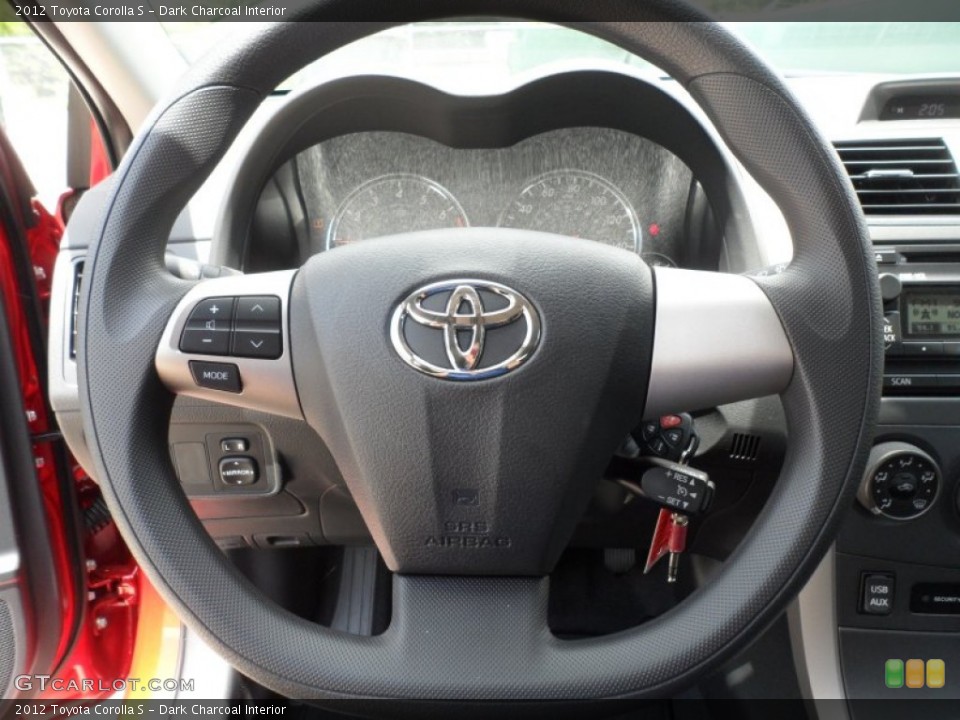 Dark Charcoal Interior Steering Wheel for the 2012 Toyota Corolla S #66657505