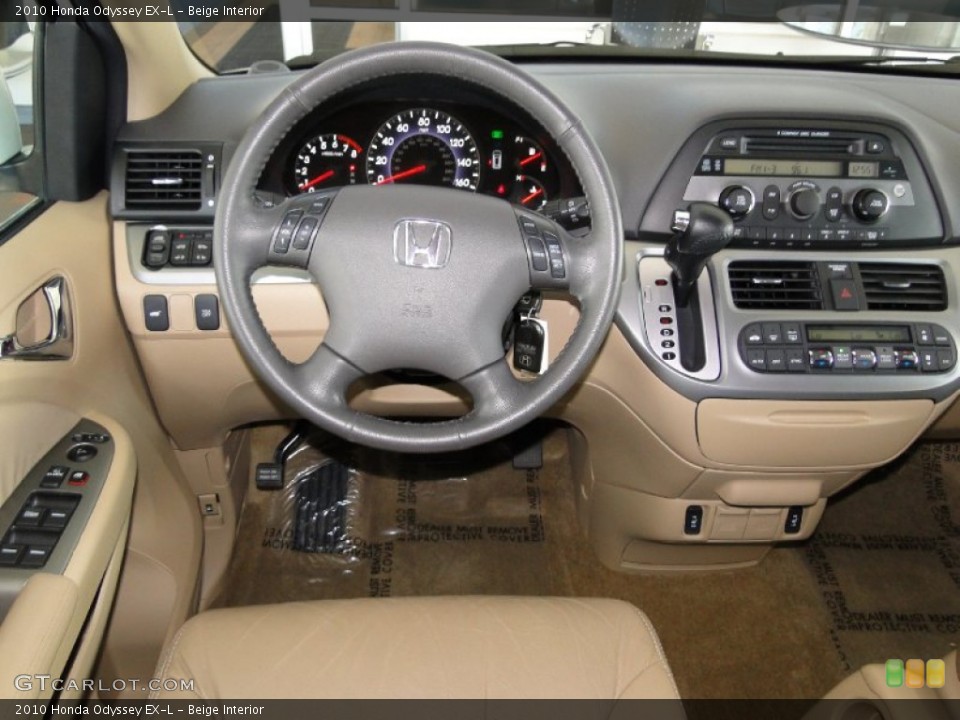 Beige Interior Dashboard for the 2010 Honda Odyssey EX-L #66661184