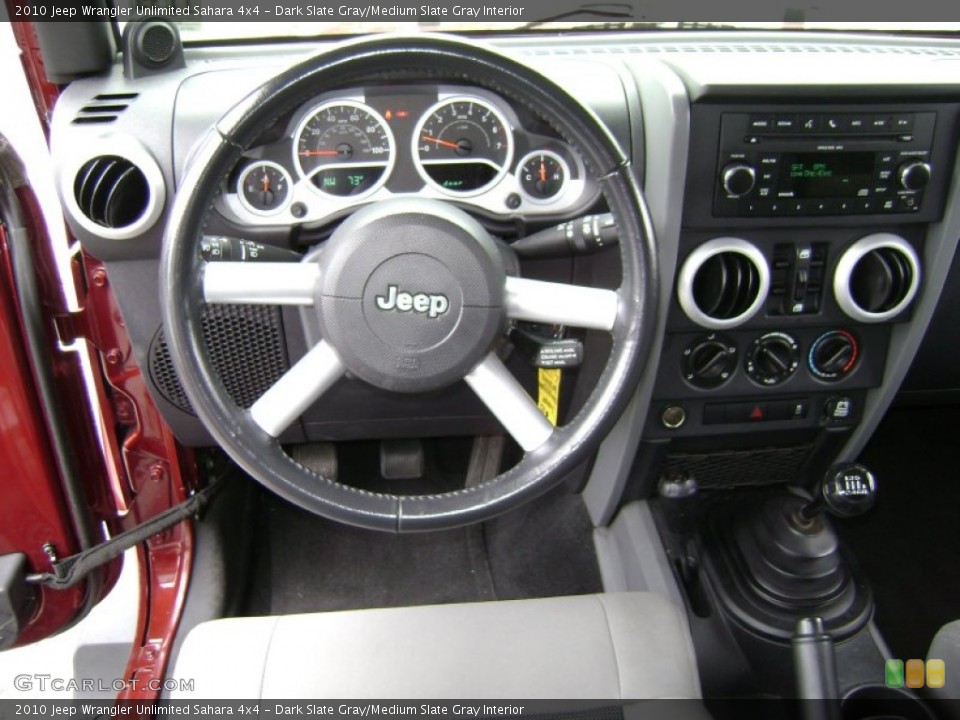 Dark Slate Gray/Medium Slate Gray Interior Dashboard for the 2010 Jeep Wrangler Unlimited Sahara 4x4 #66677108