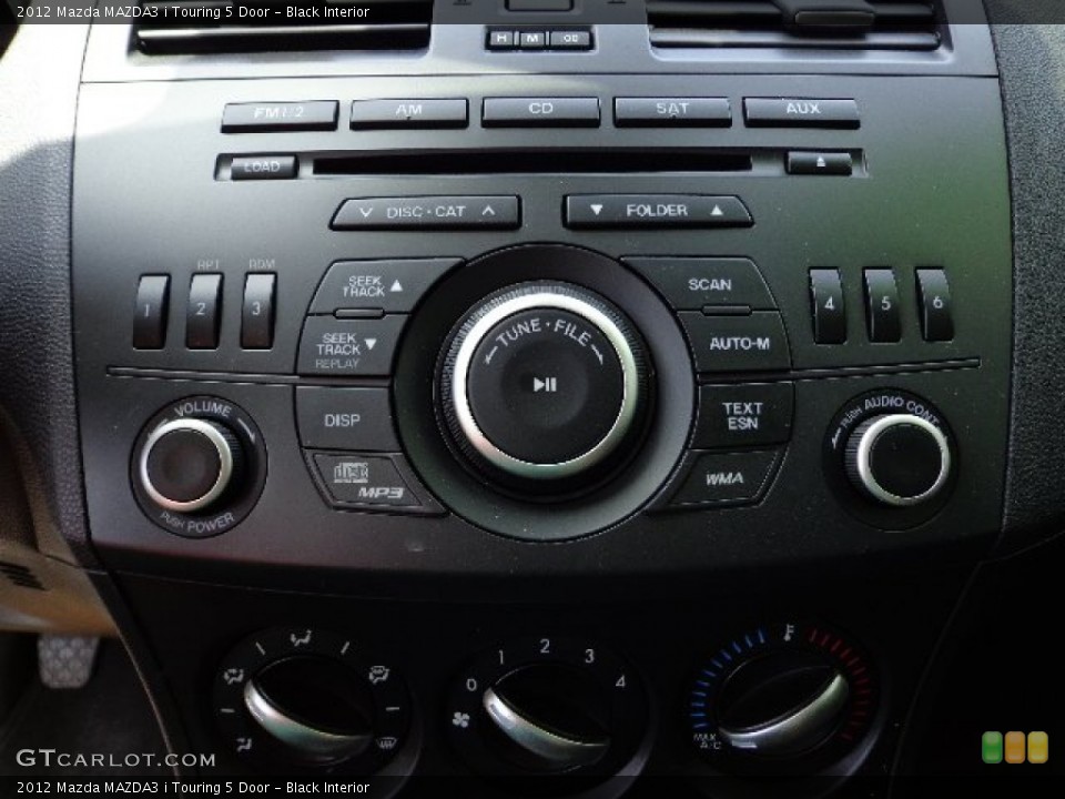 Black Interior Controls for the 2012 Mazda MAZDA3 i Touring 5 Door #66690345