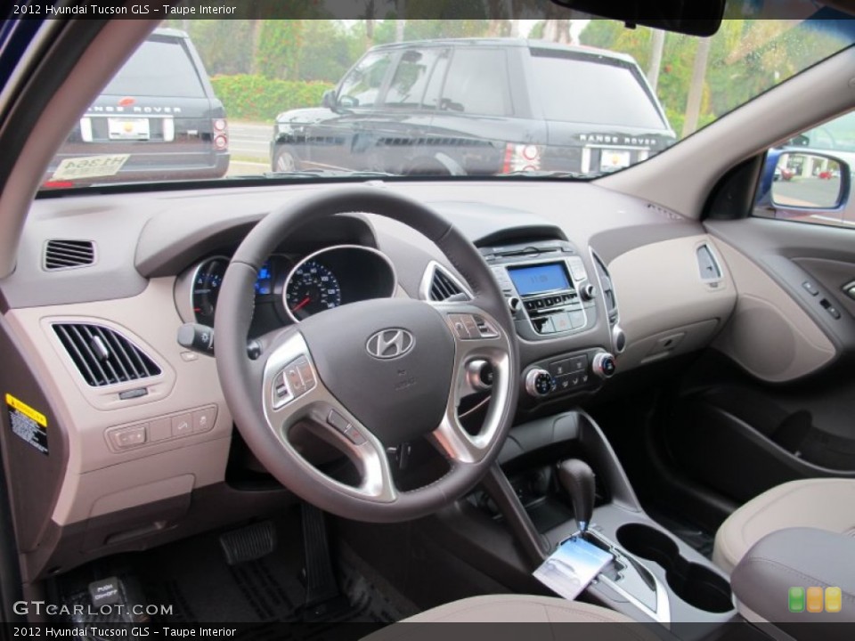 Taupe Interior Dashboard for the 2012 Hyundai Tucson GLS #66693089