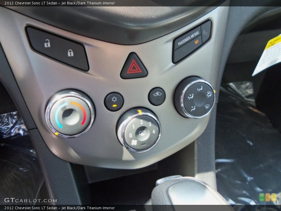 Jet Black/Dark Titanium Interior Controls for the 2012 Chevrolet Sonic LT Sedan #66697433