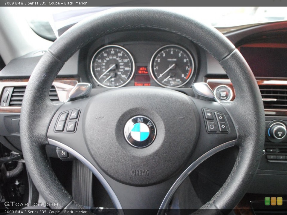 Black Interior Steering Wheel for the 2009 BMW 3 Series 335i Coupe #66707948