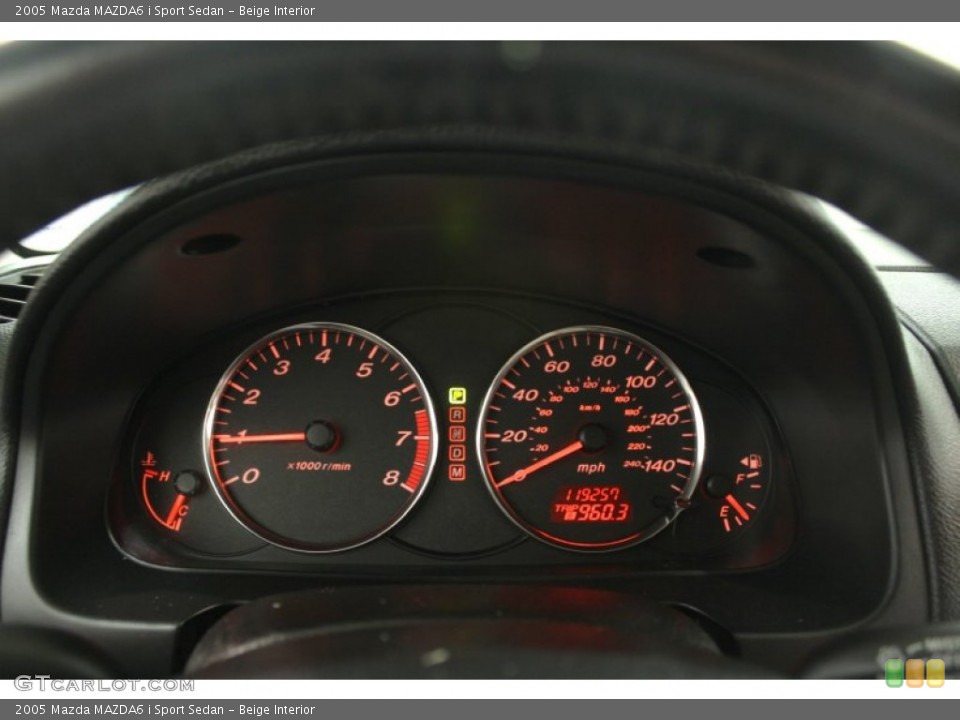 Beige Interior Gauges for the 2005 Mazda MAZDA6 i Sport Sedan #66774734