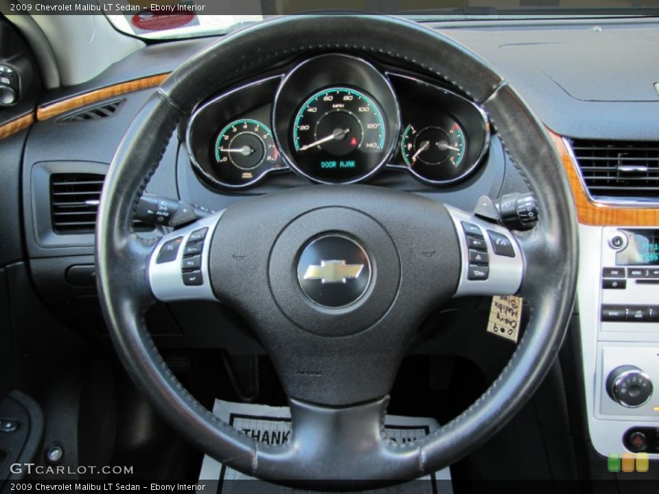 Ebony Interior Steering Wheel for the 2009 Chevrolet Malibu LT Sedan #66830046