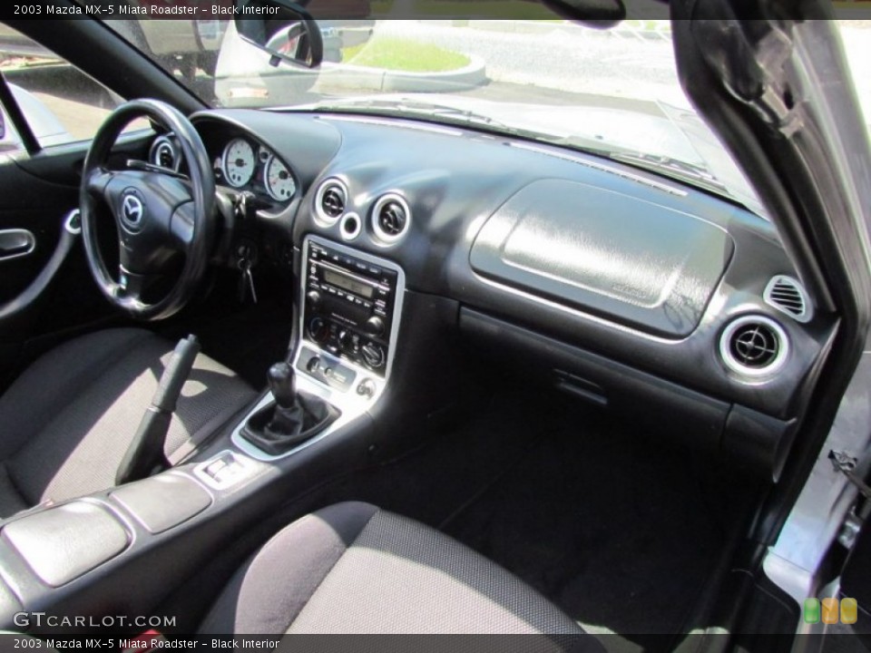 Black Interior Dashboard for the 2003 Mazda MX-5 Miata Roadster #66831560