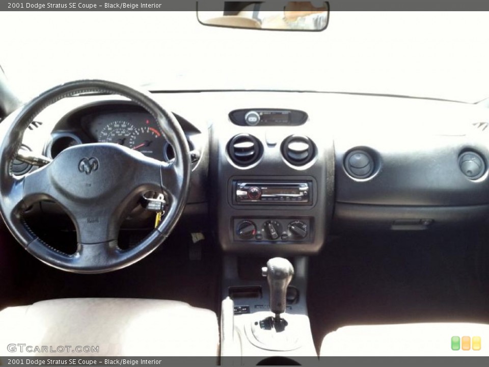 Black/Beige Interior Dashboard for the 2001 Dodge Stratus SE Coupe #66849941