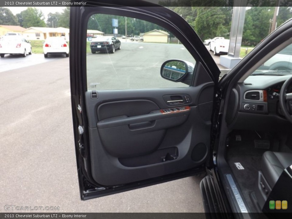 Ebony Interior Door Panel for the 2013 Chevrolet Suburban LTZ #66874211