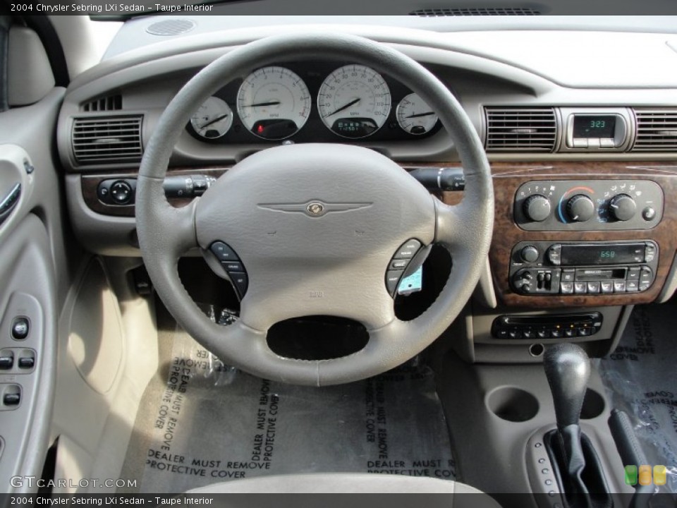 Taupe Interior Dashboard for the 2004 Chrysler Sebring LXi Sedan #66944389