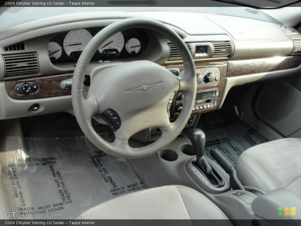 Taupe Interior Dashboard for the 2004 Chrysler Sebring LXi Sedan #66944392