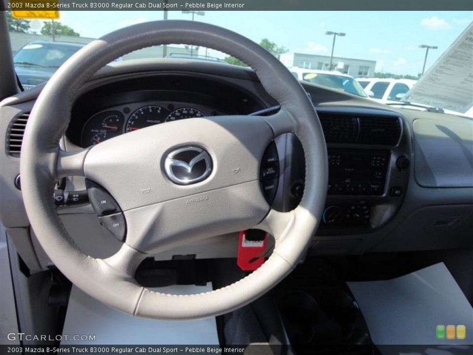 Pebble Beige Interior Steering Wheel for the 2003 Mazda B-Series Truck B3000 Regular Cab Dual Sport #66967954