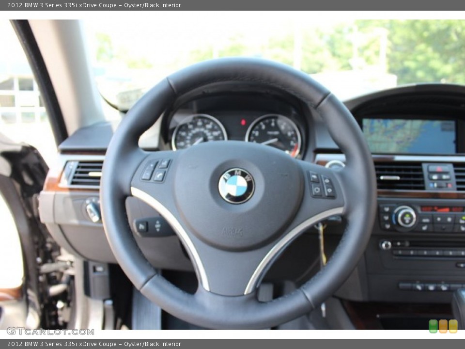 Oyster/Black Interior Steering Wheel for the 2012 BMW 3 Series 335i xDrive Coupe #66974758