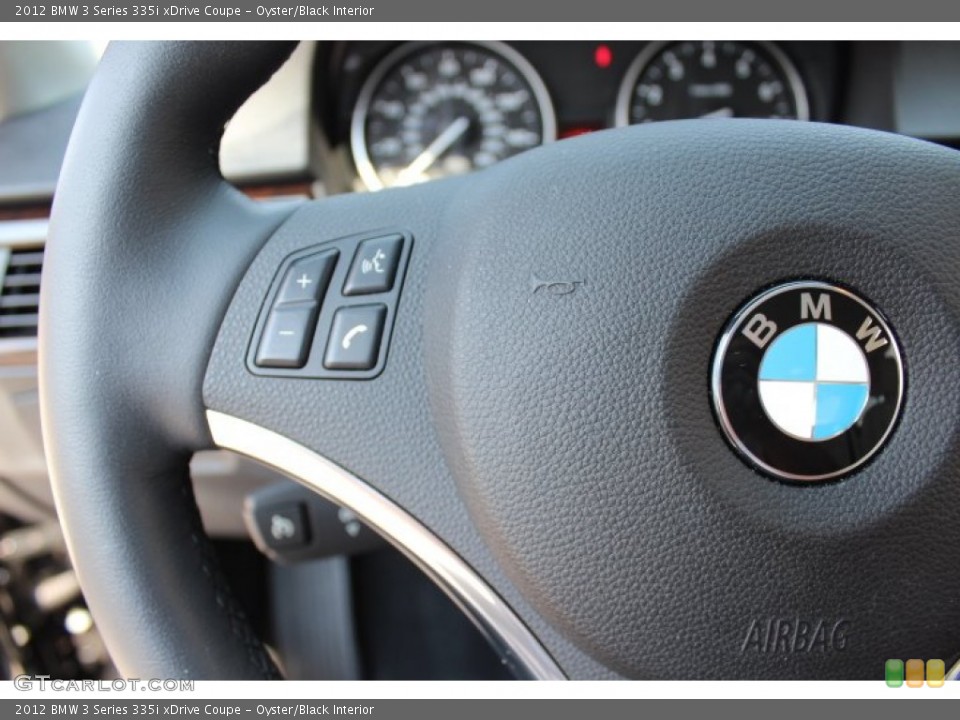 Oyster/Black Interior Controls for the 2012 BMW 3 Series 335i xDrive Coupe #66974767