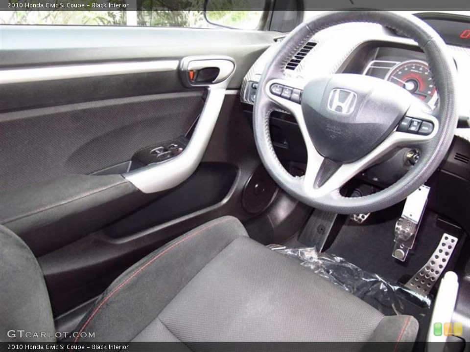 Black Interior Steering Wheel for the 2010 Honda Civic Si Coupe #66988726