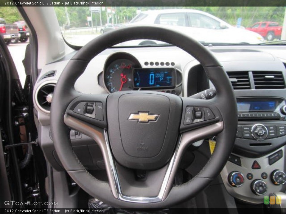 Jet Black/Brick Interior Steering Wheel for the 2012 Chevrolet Sonic LTZ Sedan #67013571