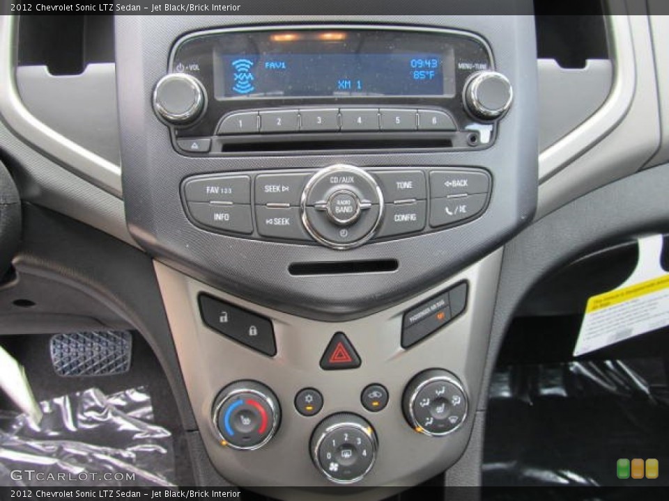 Jet Black/Brick Interior Controls for the 2012 Chevrolet Sonic LTZ Sedan #67013579