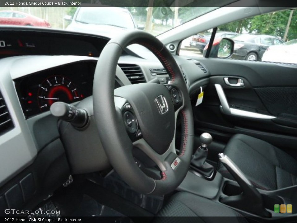 Black Interior Steering Wheel for the 2012 Honda Civic Si Coupe #67096334