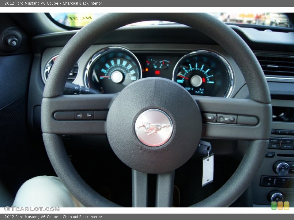 Charcoal Black Interior Steering Wheel for the 2012 Ford Mustang V6 Coupe #67097634