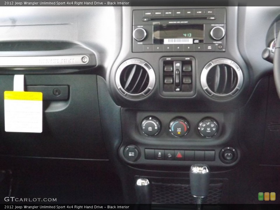 Black Interior Controls for the 2012 Jeep Wrangler Unlimited Sport 4x4 Right Hand Drive #67121261