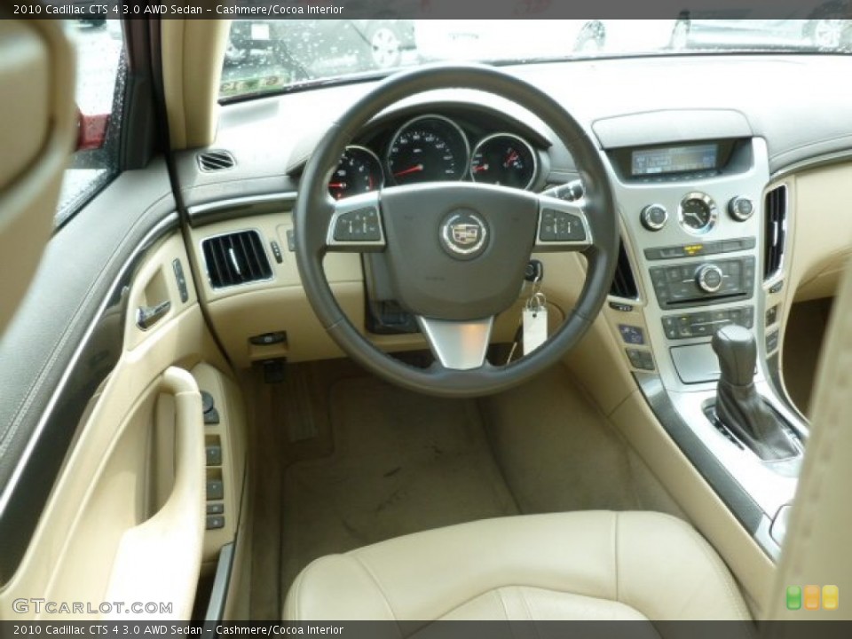 Cashmere/Cocoa Interior Dashboard for the 2010 Cadillac CTS 4 3.0 AWD Sedan #67162535