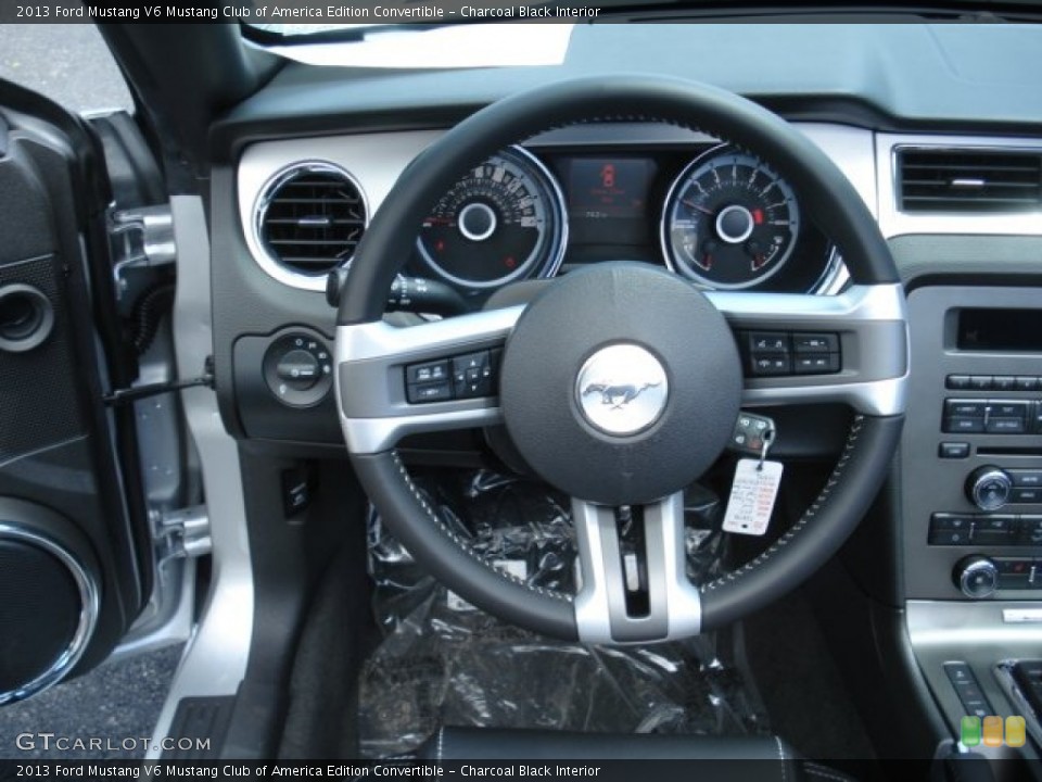 Charcoal Black Interior Steering Wheel for the 2013 Ford Mustang V6 Mustang Club of America Edition Convertible #67205643