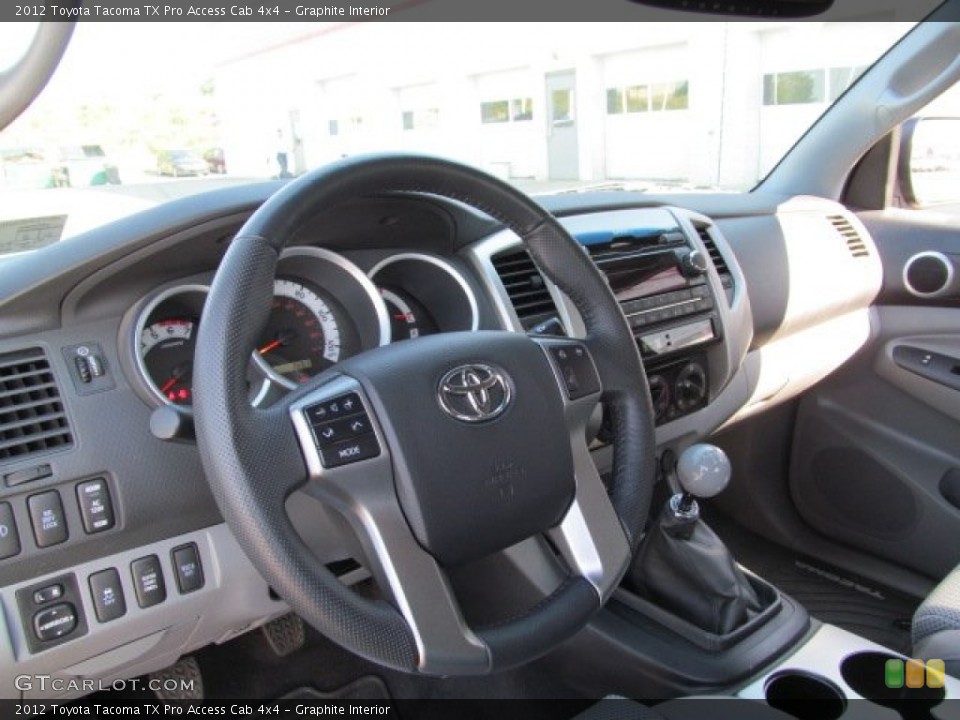Graphite Interior Dashboard for the 2012 Toyota Tacoma TX Pro Access Cab 4x4 #67219730