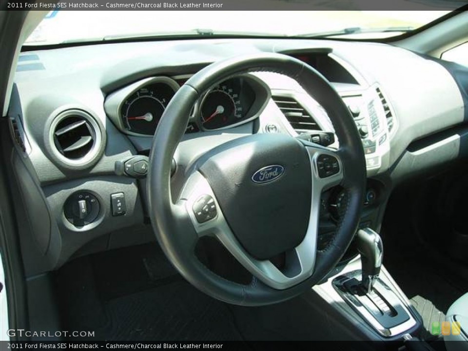 Cashmere/Charcoal Black Leather Interior Steering Wheel for the 2011 Ford Fiesta SES Hatchback #67234839