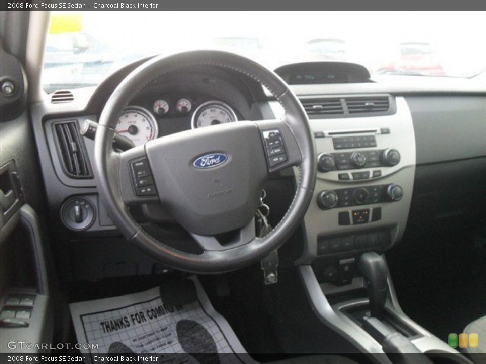 Charcoal Black Interior Dashboard for the 2008 Ford Focus SE Sedan #67291256