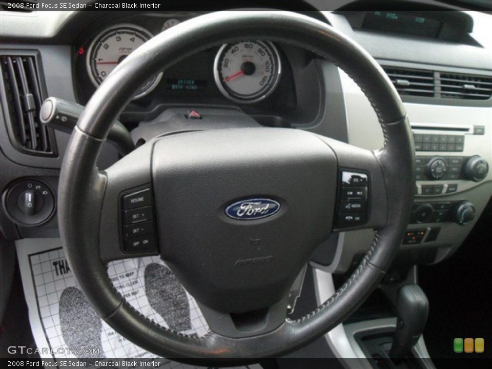Charcoal Black Interior Steering Wheel for the 2008 Ford Focus SE Sedan #67291301