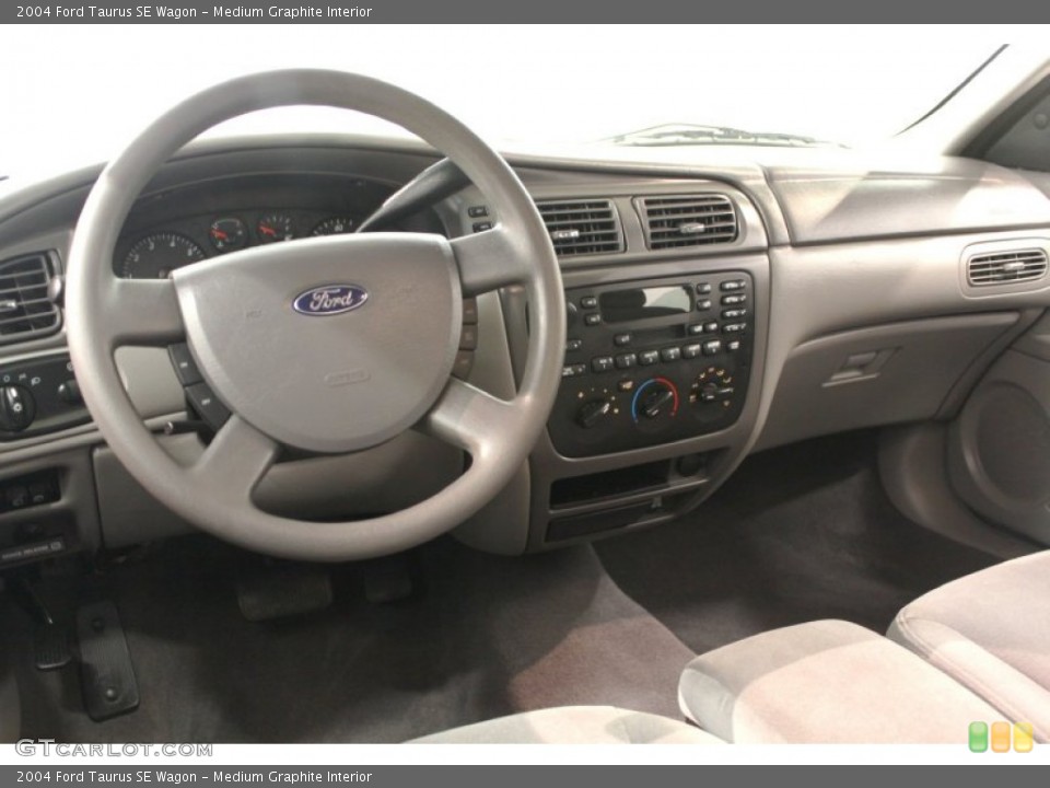 Medium Graphite Interior Dashboard for the 2004 Ford Taurus SE Wagon #67340978