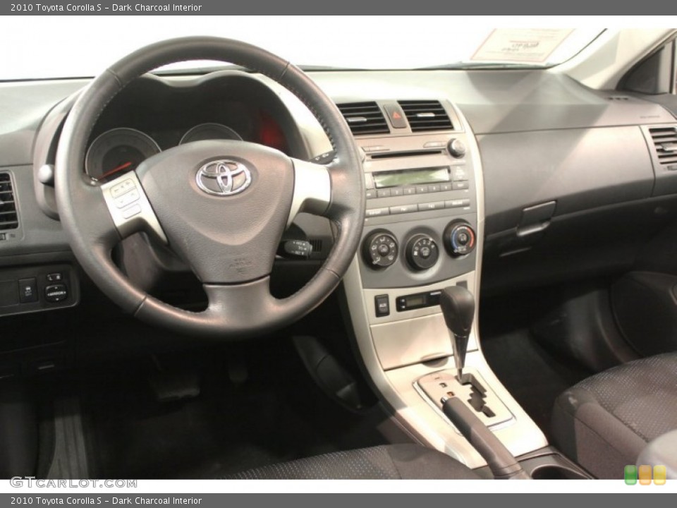 Dark Charcoal Interior Dashboard for the 2010 Toyota Corolla S #67341386