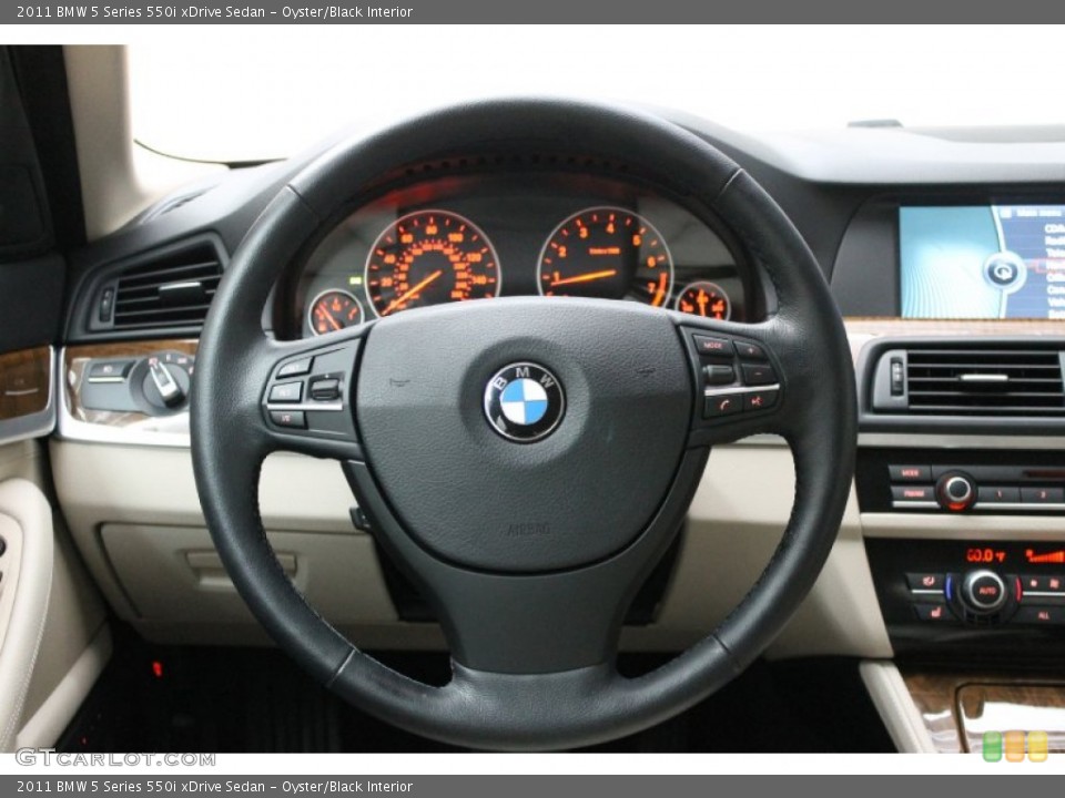 Oyster/Black Interior Steering Wheel for the 2011 BMW 5 Series 550i xDrive Sedan #67341662