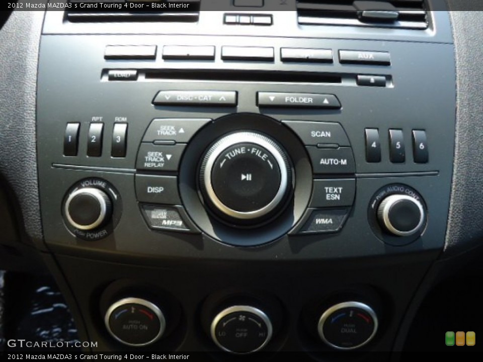 Black Interior Controls for the 2012 Mazda MAZDA3 s Grand Touring 4 Door #67347236