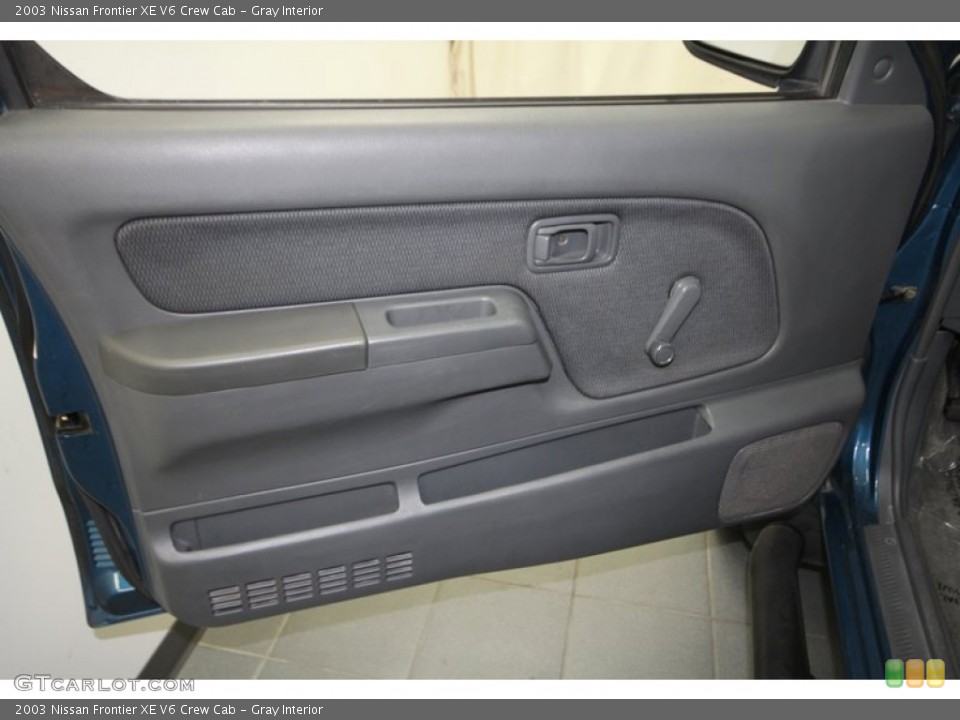Gray Interior Door Panel for the 2003 Nissan Frontier XE V6 Crew Cab #67349739
