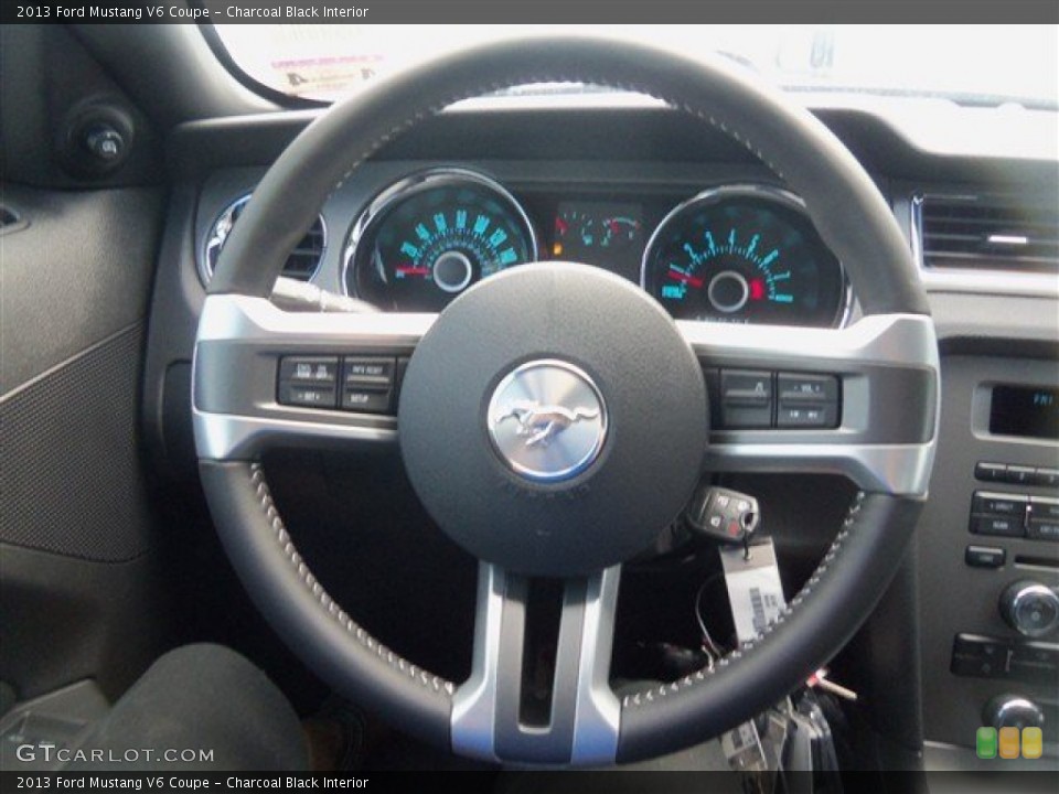 Charcoal Black Interior Steering Wheel for the 2013 Ford Mustang V6 Coupe #67431783