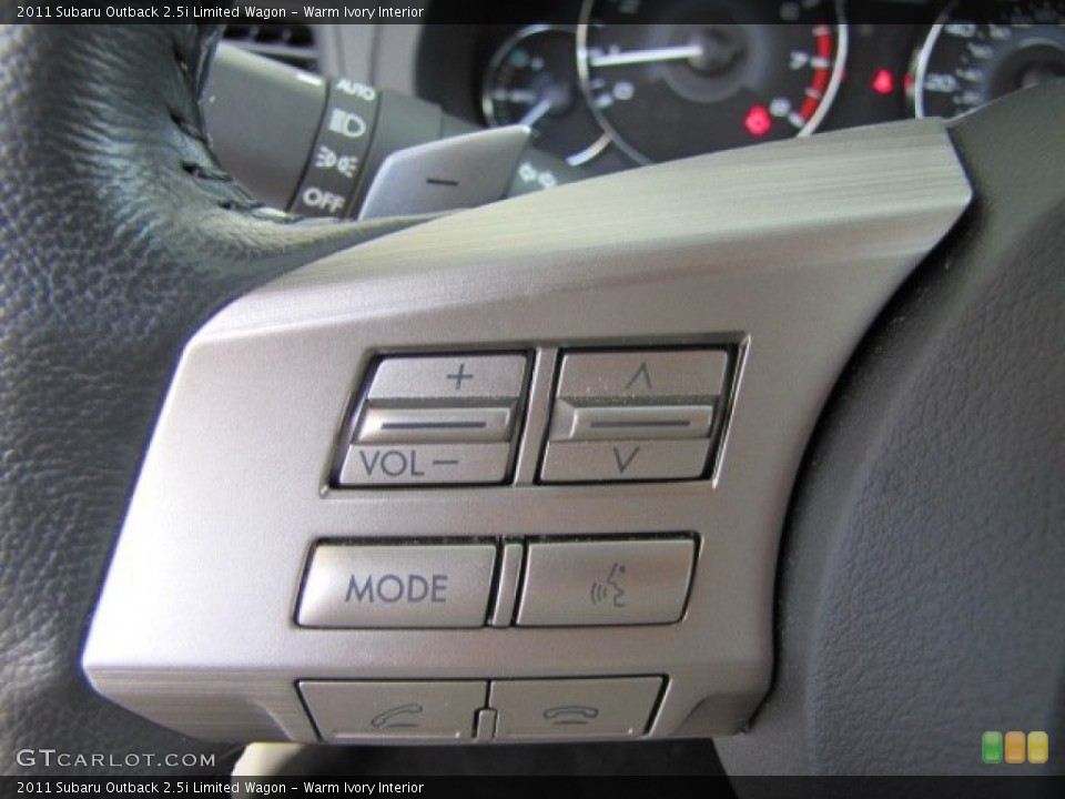 Warm Ivory Interior Controls for the 2011 Subaru Outback 2.5i Limited Wagon #67466938