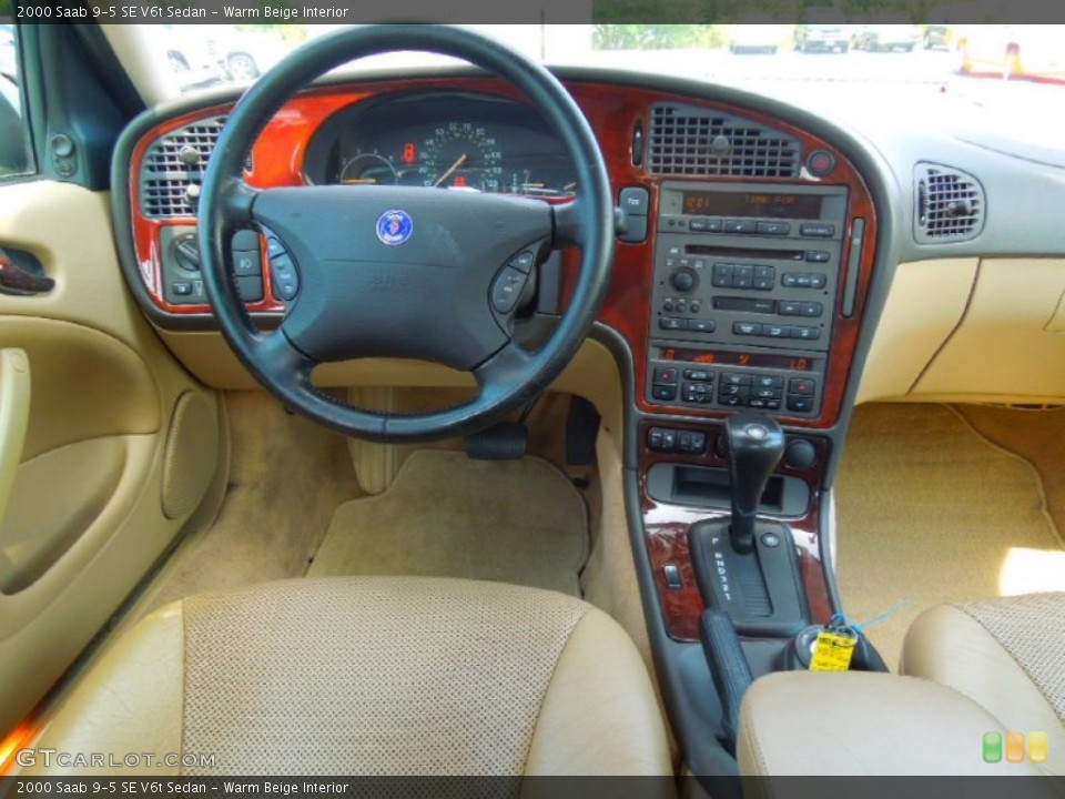 Warm Beige Interior Dashboard for the 2000 Saab 9-5 SE V6t Sedan #67474042