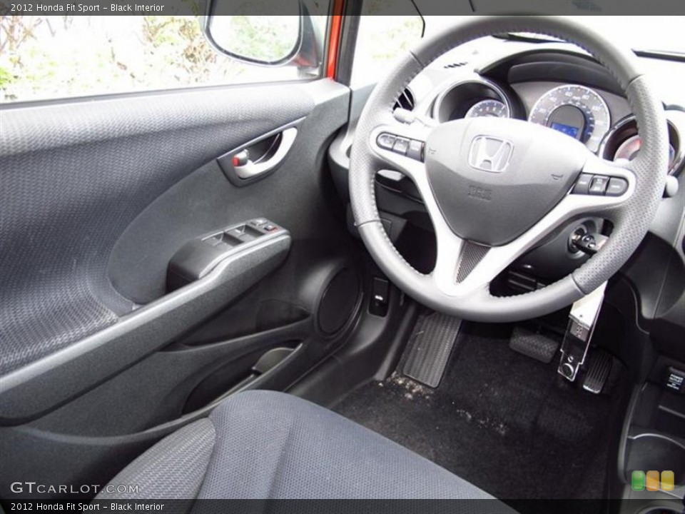 Black Interior Steering Wheel for the 2012 Honda Fit Sport #67528679