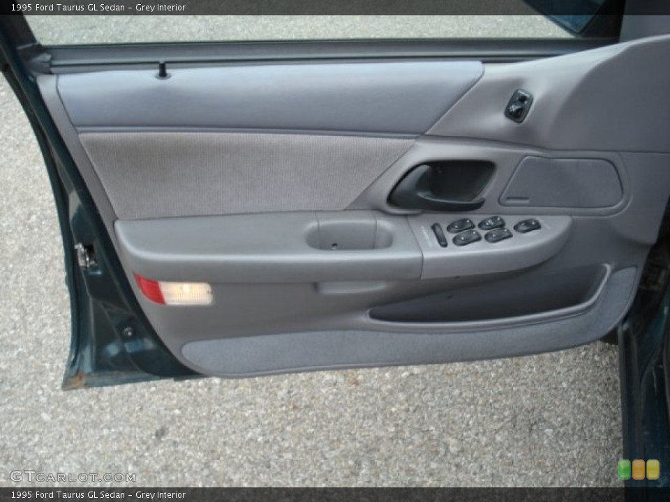 Grey Interior Door Panel for the 1995 Ford Taurus GL Sedan #67552626