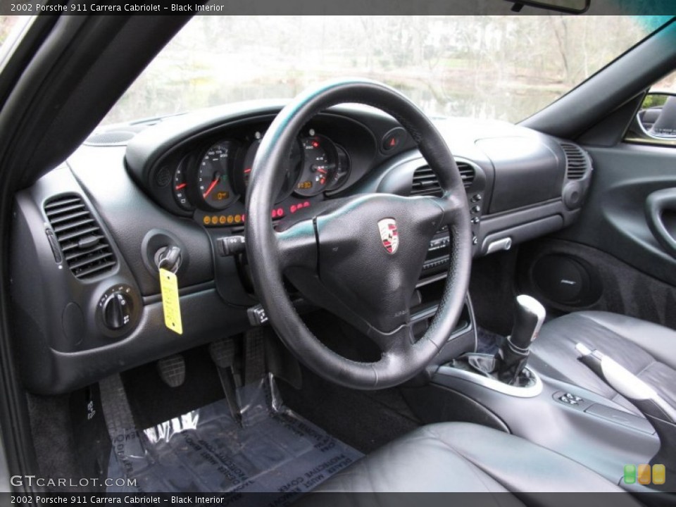Black Interior Prime Interior for the 2002 Porsche 911 Carrera Cabriolet #67567846